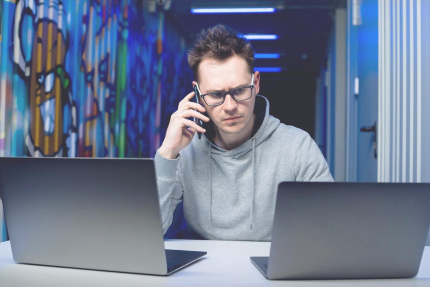 Business professional reviewing analytics data dashboard on desktop computer
